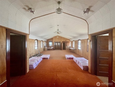 Roofing materials can be seen in the background.