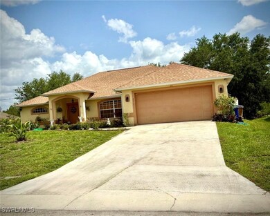 View of front of house with stucco siding, a front