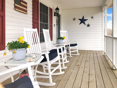 Lovely front porch with seasonal view of the Cumberland River/Lake Barkley.