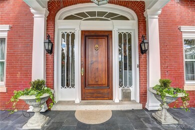 Grand entry with beveled glass in the fan and side lights