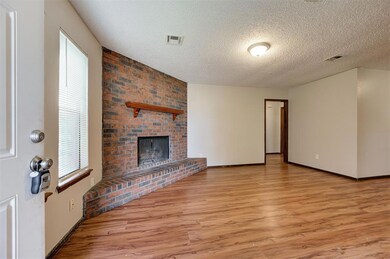 Unfurnished living room featuring a healthy amount