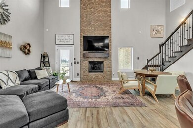 Living room with plenty of natural light, light ce