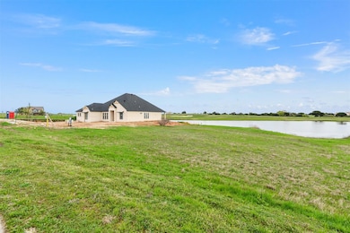 View of yard featuring a water view
