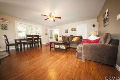 Great room with dining and living space.