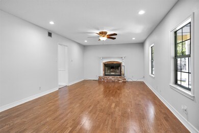 IN THIS FRESHLY PAINTED, HUGE LIVING AREA THERE IS PLENTY OF ROOM FOR TWO ENTERTAINMENT SPACES HERE. A COZY FIREPLACE SITTING AREA AND A TV LIVING AREA TOO!