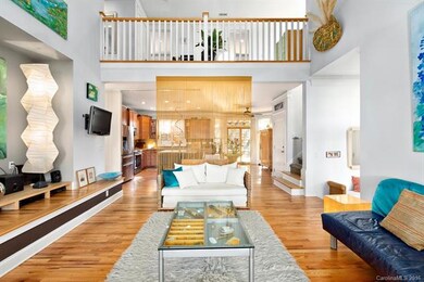 Vaulted Ceilings, Warm wood flooring make this con