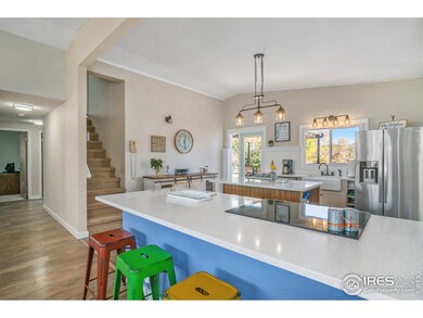 Beautifully Updated Kitchen with Island, Quartz Countertops and Brand New Fixtures