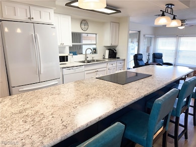 5513 Sir Walters Way, North Fort Myers, FL 33917 - photo 3