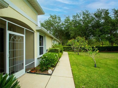 Enclosed porch at entry with lovely preserve views
