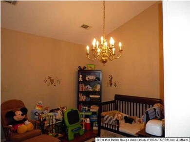 Dining room with vaulted ceiling(being used as chi