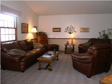 The living room offers ample space for gatherings 