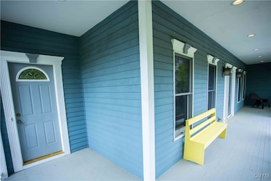 Front Porch, entry to 1st floor bedroom.
