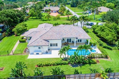 Back yard views showing privately landscaped pool