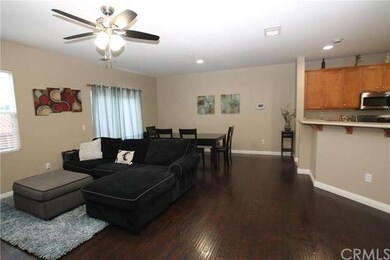 Kitchen opens up to family room and dining area.