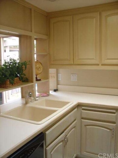 Notice the lovely natural light from the kitchen S