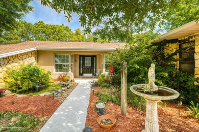 Front of home with fountain