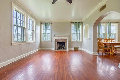 Unfurnished living room featuring a premium firepl