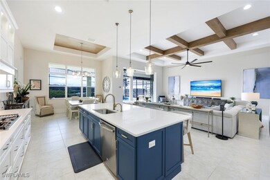 Kitchen featuring blue cabinets, white cabinets, p