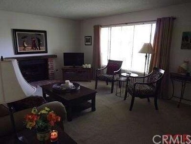 Another view of living room. Light, airy. Neat and