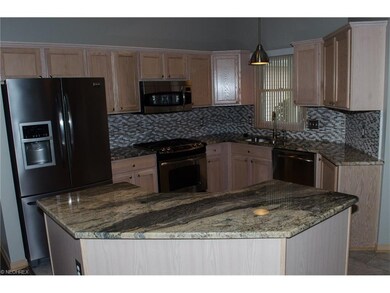 Large, open kitchen with Stainless Steel appliance