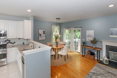 From your stairs, a look at the Living room area, Dining area and Kitchen