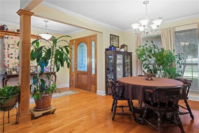 Open entry foyer and dining area