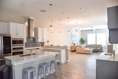 Kitchen featuring a sink, appliances with stainles