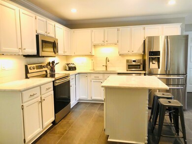 Kitchen featuring sink, stainless steel appliances