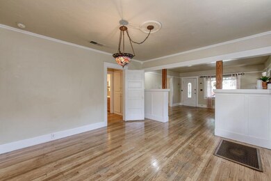 The hallway features storage closets and built-in 