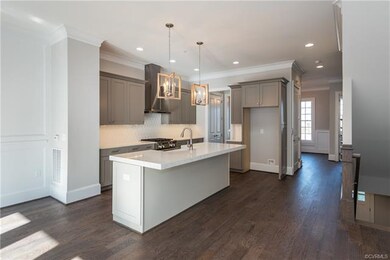 Open flow kitchen with quartz countertops and cust