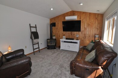 Living room is open to the dining area and kitchen