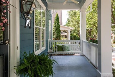 Great front porch with a porch swing to enjoy sout
