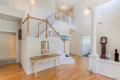 Dramatic Foyer w/18' Ceilings & Beautiful Staircas