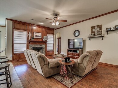 LARGE FAMILY ROOM WITH HAND SCRAPED HARD WOOD FLOO