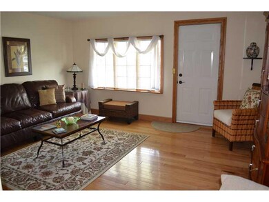 Living Room. Bright living room with oak hardwood 