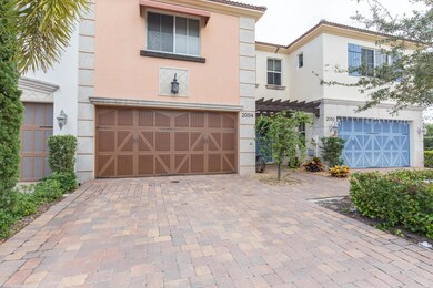 Pavered Driveway and 2 Car Garage