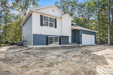 View of front of home with an attached garage