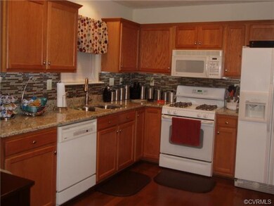 Newly remodeled kitchen with granite counters, mos