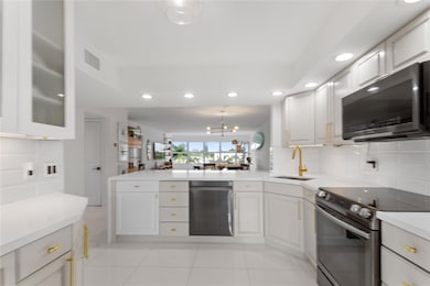 COASTAL LIVING AT ITS BEST FOR BEACH & BOAT LOVERS IN LAUDERDALE BY THE SEA. THIS REMODELED FULLY FURNISHED ~ TURNKEY SPLIT FLOOR PLAN FEATURES 2/BEDS 2/BATHS LOCATED DIRECTLY ON THE CANAL W/ AMAZING WATER VIEWS. KITCHEN FEATURES SAMSUNG BESPOKE SERIES APPLIANCES W/ FAMILY HUB, QUARTZ COUNTERTOPS, NEW TANKLESS HWH & WHOLE UNIT WATER FILTRATION. IN UNIT LG WASHER/ DRYER, 24