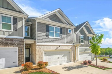 Multi unit property featuring an attached garage, 