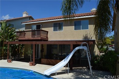 VIEW OF BACKYARD/COVERED PATIO/BALCONY