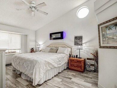 Beautiful natural light filters into the master be
