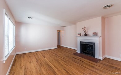 Family room - hardwood floor, fireplace, mantle