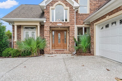 Entrance to property with a garage