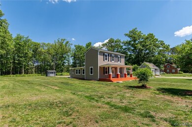 View of front of property with a front yard