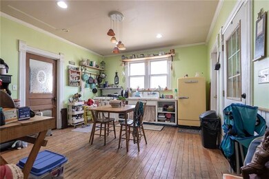 Kitchen with true simple early 1900's feel. Door t