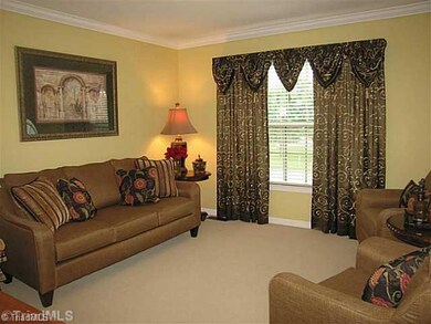 Living Room. The living room overlooks the entry which makes it an ideal space to welcome guests!  The neutral colors and spotless carpet make it move-in ready!