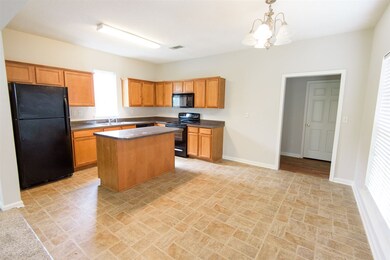 Through the opening there is a 2nd full bath, a 3r