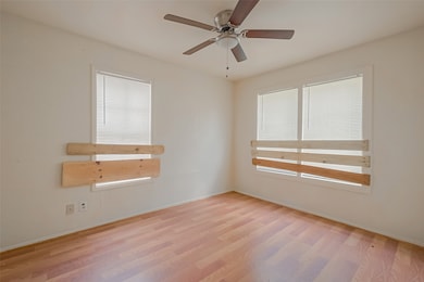 The ceiling fan provides a soothing breeze, creati
