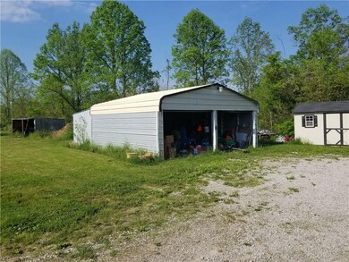 2 car detached garage  and separate shed